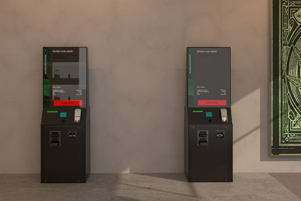 Two Giosk 32 Cash kiosks installed against a retail wall