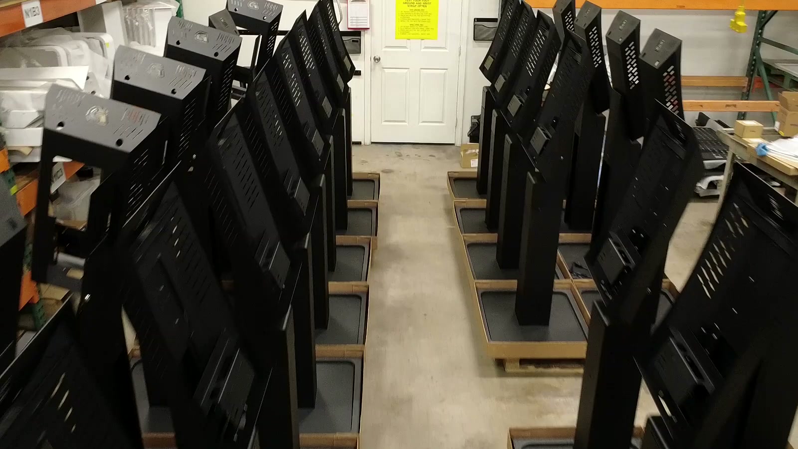 Rows of custom Dispensify kiosk enclosures staged during manufacturing in Gilbert, Arizona